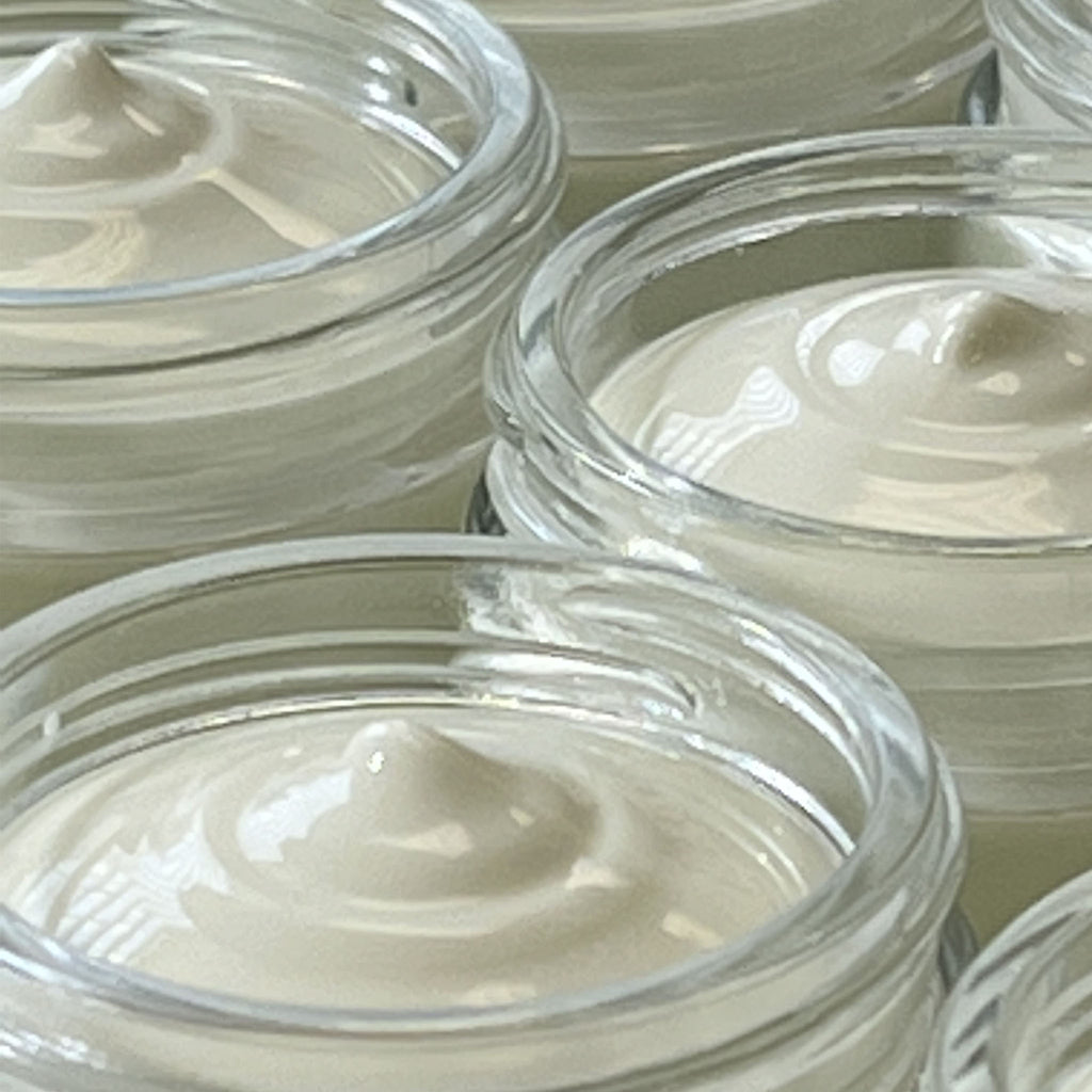 View of open jars of Love your face cream Original Formula